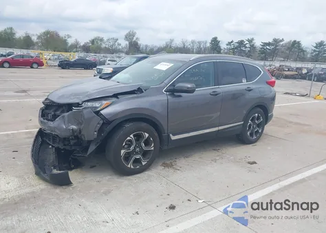 2019 Honda Cr-V Touring z USA, uszkodzony, nr VIN JHLRW2H92KX000812